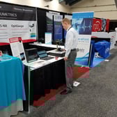 Fil setting up the OptiGauge before Day 3 Photonics West begins